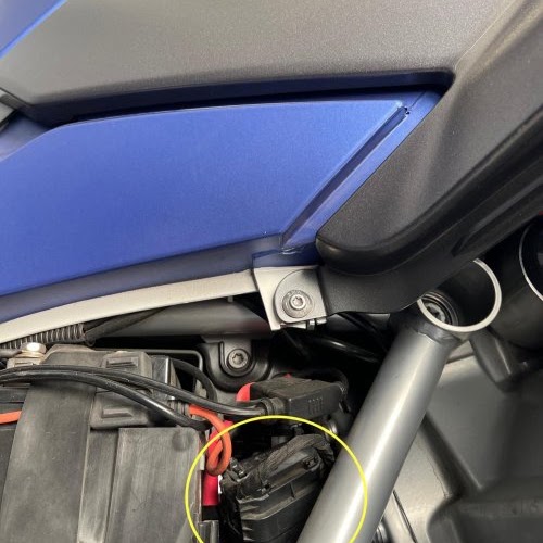 BMW R1250GS OBD2 connection location beneath the side panel